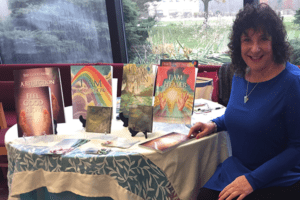 Author, Healer, Teacher Roseanne D'Erasmo Script with her Energy Healing Book Series, and her latest book and reflection guide: "Feel Good Now: A Coursework in energy healing"